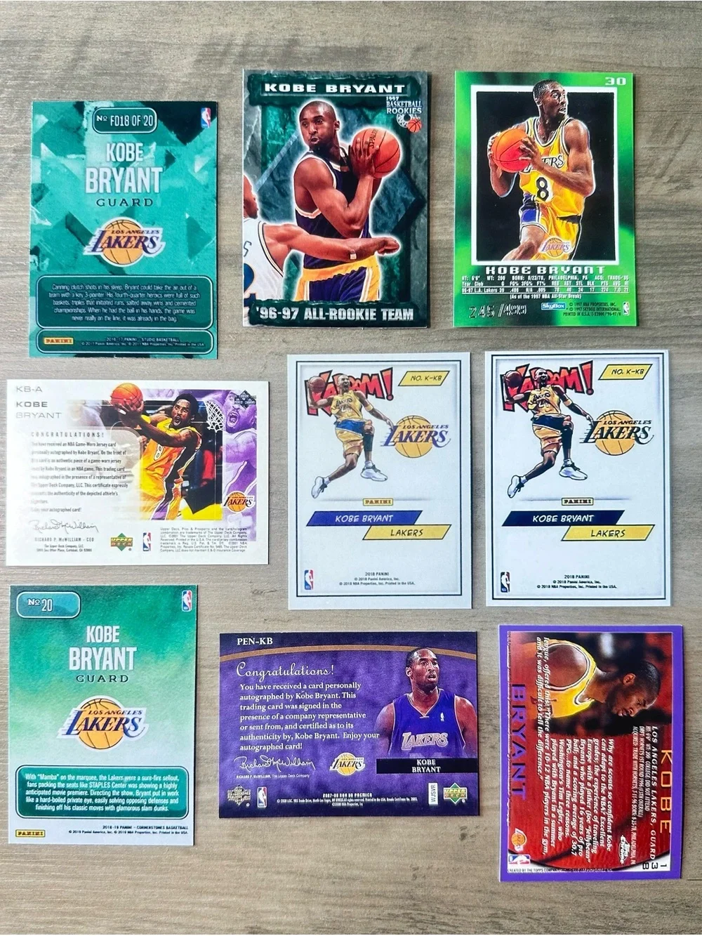 Kobe Bryant Signed Rookie Lot of (9) Kaboom Downtown Novelty Basketball Cards.